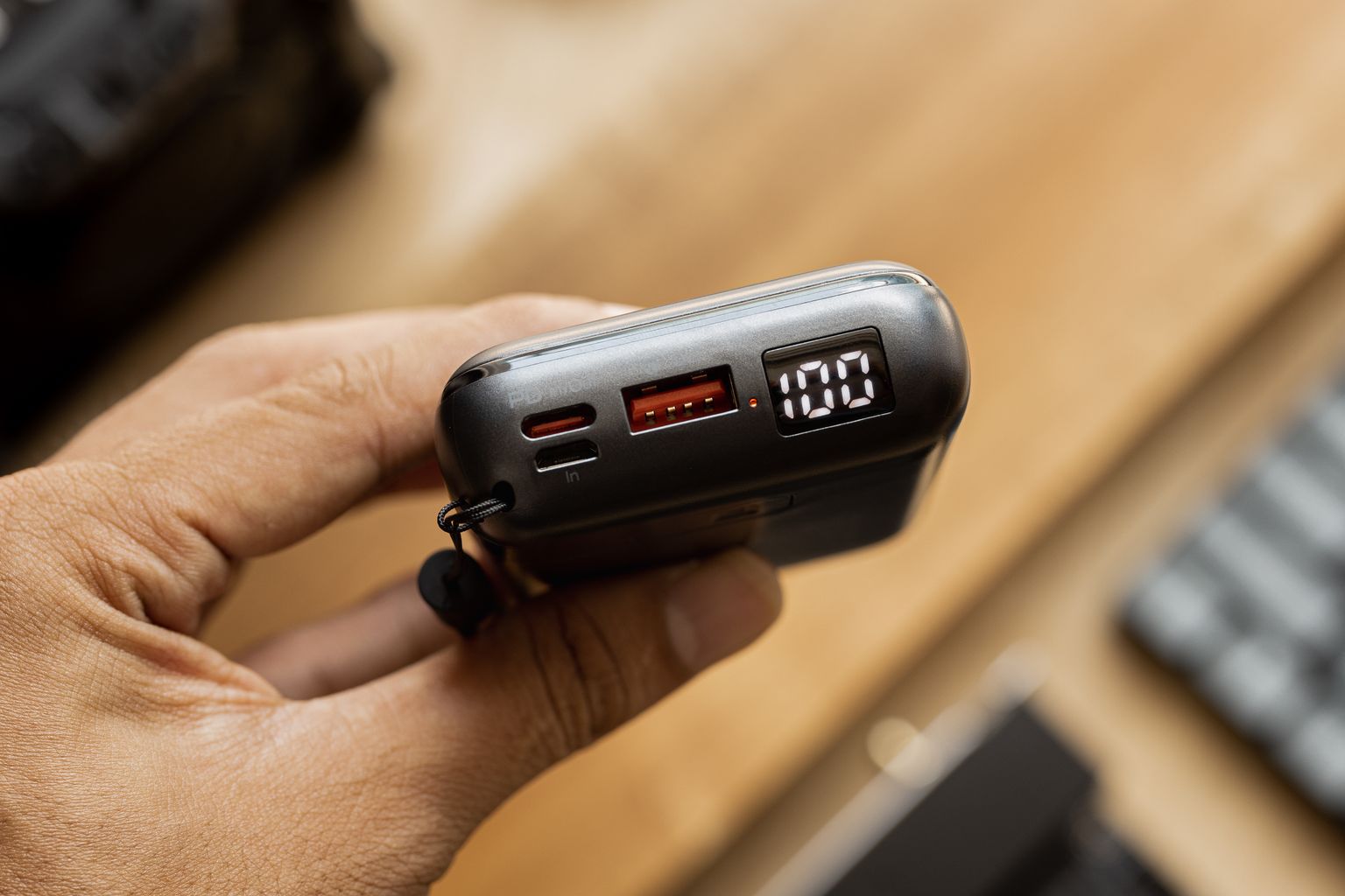 Power bank showing real capacity on its digital display